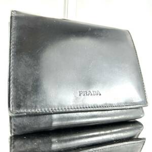 1円〜 プラダ PRADA 折財布 レザー ボタン ロゴ ウォレット レディース メンズ ブラック 黒 コインケース