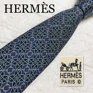 HERMES エルメス　ネクタイ　金具　総柄　シルク100% フランス製　ブルー、グレー系