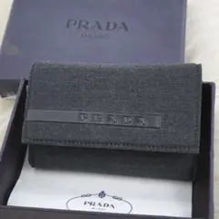 極美品　箱付き　PRADA プラダ　6連キーケース　キャンバス×レザー　文字柄