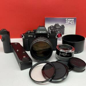 □ 防湿庫保管品 Canon New F-1 一眼レフフィルムカメラ ボディNew FD 85mm F1.2 L レンズ AE POWER WINDER FN 動作確認済 付属品 キャノン