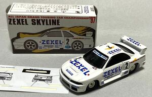 トミカ アイアイアド特注 ゼクセルスカイラインGT-R(R33) No.2 鈴木亜久里/E.コマス 1997 JGTC GT500