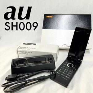 【ジャンク品】au ケータイ電話 SH009 黒 パカパカ ミッドナイトブラック 通電不可 卓上ホルダ付き 部品取り 現状販売品 [OTFM-258