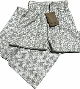 新品タグ付きバーバリーBURBERRY シルク100%ワイドパンツ 総ロゴ柄