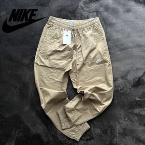 格安送料 Mサイズ 新品 NIKE ナイキ スポーツウェア カフパンツ トラックパンツ コットン ウーブン パンツ ナイロン ジョガー aDD5311-247