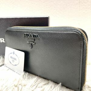 美品 ギャランティ付！プラダ PRADA 長財布 サフィアーノシャイン ラウンドファスナー ラウンドジップ メタルロゴ 黒 小銭入れ付 保存箱付