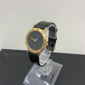 4140 GUCCI グッチ 3001M 216-272 黒文字盤 レディース腕時計　ジャンク　ゴールドカラー 