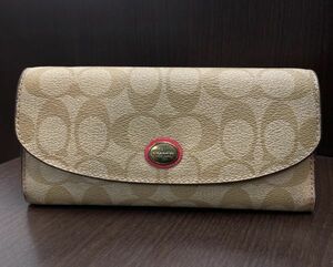 AB0221-10 COACHコーチ PVC フラップ長財布 シグネチャー カーキ系 同梱不可