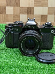 Canon キャノン フィルムカメラ 一眼レフカメラ AV-1 ブラック 黒 Made in Japan 日本製 キヤノン 銀塩カメラ レンズ付 50mm 1:2 