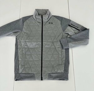 オークリー　ＯＡＫＬＥＹ　ＨＹＢＲＩＤ　ＰＵＦＦ　ＦＬＥＥＣＥ　５．０　ＦＯＡ４０４２５０　(NEW ATHLETIC GREY)　Ｌ