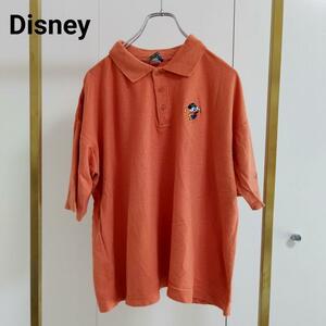 Disney(ディズニー）オレンジ/ポロシャツ