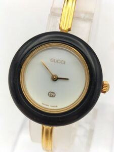 S53 三 不動品 1円～ グッチ GUCCI 11/12 チェンジベゼル バングルウォッチ 白文字盤 ゴールドカラー レディース 腕時計