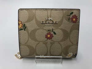 コーチ COACH 二つ折り財布 ベージュ系・CC柄・花柄 CH477