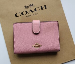 【新品】COACH コーチ 二つ折り財布 シグネチャー ピンク　レザー