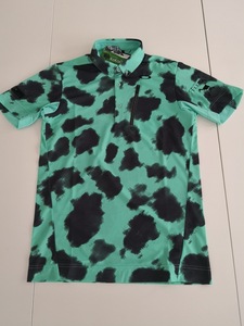 オークリー　ＳＫＵＬＬ　ＭＯＴＴＬＥ　ＳＨＩＲＴＳ　４．０　４３４３９０ＪＰ　(ＴＵＲＱＵＯＩＳＥ　ＰＲＩＮＴ)　Ｌ