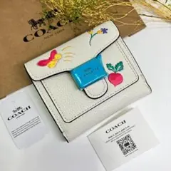 COACH コーチ　折り財布　ホワイト　白色　ドリーミーベジ柄