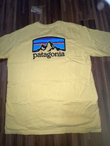 ■パタゴニア■新品M 黄色のバックプリントTシャツ