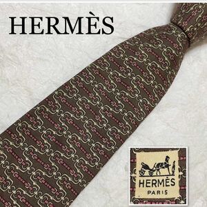 ■美品■HERMES エルメス　ネクタイ　金具　ベルト　総柄　シルク100% フランス製　ブラウン