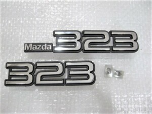 ★希少 323 マツダ Mazda323 ロゴ ファミリア323? BD系? フロント&リアエンブレム 新品 2点 旧車