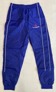 le coq sportif QS-4703 ナイロンウインドパンツ L-O 未使用 ルコック Wind Pants ジョガーパンツ トルビオン デッドストック 90s 