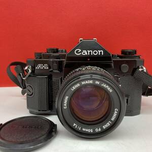 □ Canon A-1 一眼レフカメラ フィルムカメラ ボディ New FD 50mm F1.4 レンズ シャッター、露出計OK キャノン