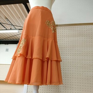 ライトオレンジ2段ゴールドモチーフ付スカート