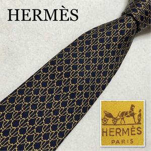 ■美品■HERMES エルメス　ネクタイ　金具　総柄　シルク100% フランス製　ネイビー　ビジネス