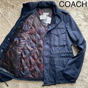 新品未使用タグ付き/L相当/COACH コーチ ミリタリージャケット ナイロンジャケット M-65 MA-1 ブルゾン ジャケット ネイビー 裏地 総柄 