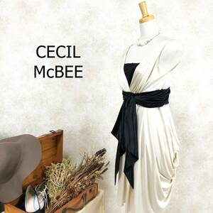 セシルマクビー CECIL McBEE ドレス M ゴールドベージュ ブラック スパンコール ひざ丈 日本製 リボン カシュクール風 とろみ B-573