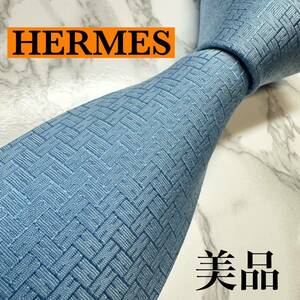 美品 現行タグ 定番 HERMES ネクタイ シルク100% ファソネH 馬車 レギュラータイ ブランドロゴ 刺繍 ライトブルー 送料無料