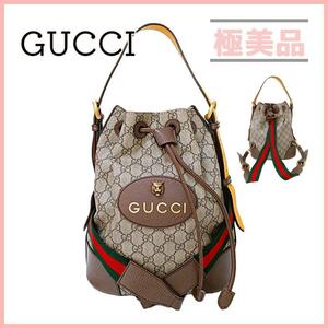 グッチ 473875 GGスプリーム ショルダーバッグ タイガー レディース GUCCI 巾着 リュック バックパック 2way ブラウン ベージュ イエロー