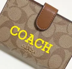 COACH コーチ　二つ折り財布 ミディアム コーナー ジップ カーキ×サドル