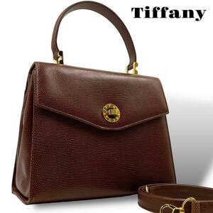 良品 Tiffany ティファニー　2way ハンドバッグ リザード型押し ターンロック 茶