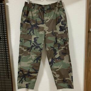 Alpha Industries (アルファ・インダストリーズ) - Men カーゴパンツ Lサイズ 81-86cm カモフラ柄 WOODLAND CAMO (タグ付き新品未使用)