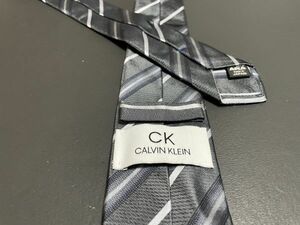 【美品】CalvinKlein　カルバンクライン　レジメンタル柄　ネクタイ　3本以上送料無料　グレイ
