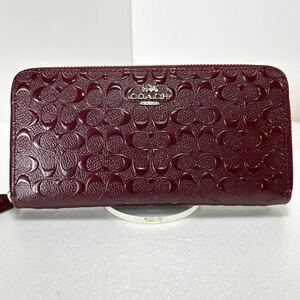 ◆COACH コーチ　長財布◆　シグネチャー　ラウンドジップ　エナメル　小銭入れ有　ボルドー　ほつれ有り 【USED】0306