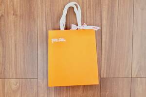 紙袋★Folli Follie フォリフォリ・オレンジ色リボン付き１点