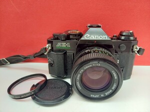 ■ Canon AE-1 PROGRAM ボディ FD 50mm F1.4 レンズ フィルム一眼レフカメラ 動作確認済 シャッター、露出計OK キャノン