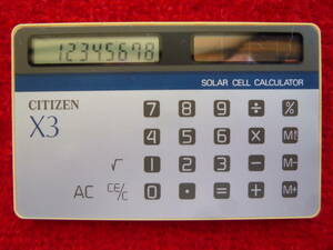 ソーラー電卓　シチズン製　X３　昭和59年頃発売され、当時は斬新でよく売れました。動作確認済み　未使用品　透明カバー付き