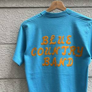 80s 90s USA古着 水色 バックプリント 半袖Tシャツ ライトブルー フロッキープリント アメリカ古着 vintage ヴィンテージ プリントTシャツ