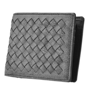 SONNE　じっくりと変化を楽しめるベジタブルタンニンレザーの二つ折り財布（小銭入れ付） 黒色