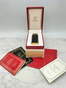 C58 1円～ 中古品 ※火打ち、着火未確認※ Cartier カルティエ オーバル型 ガスライター ブラック 黒×ゴールドカラー 喫煙グッズ 箱付