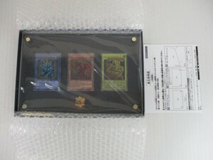 K1004 送料無料！ 遊戯王カードゲーム25周年記念商品「三幻神」スペシャルカードセット(ステンレス製) 箱潰れあり/極美品