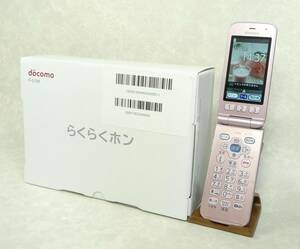 2869【充電器付きフルセット/極めて美品/SIMロック解除済み】らくらくホン　F-01M　ピンク卓上ホルダF49