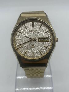 Y991 SEIKO セイコー QUARTZ クォーツ 腕時計 GRAND グランドクォーツ　デイト　9943-8020 雪目文字盤　ゴールド　GOLD 白文字盤