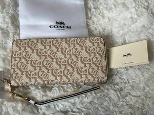 119 新品 COACH コーチ 長財布 ラウンドファスナー CF521