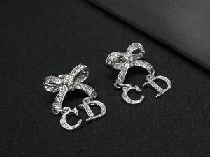 1円 ■美品■ ChristianDior クリスチャンディオール ラインストーン リボン ピアス アクセサリー レディース シルバー系 AV9273