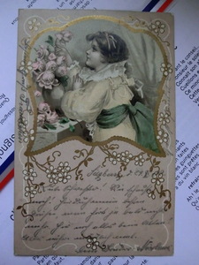 アンティーク　古いポストカード・絵葉書 　* 薔薇を愛でる優雅な女性 * 1902年消印 